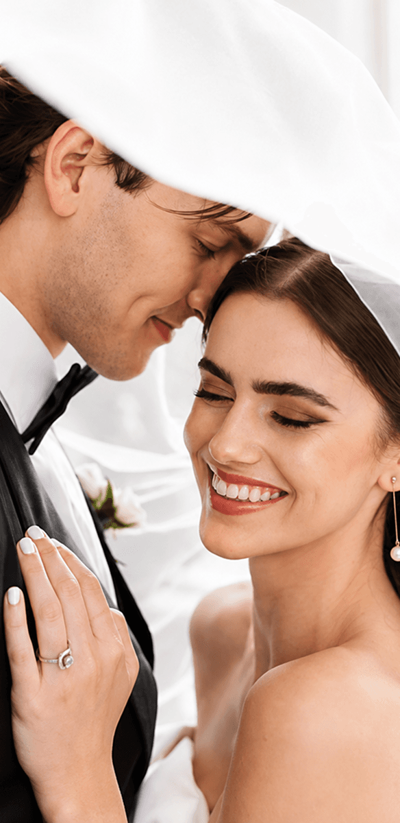 A bride having her hair styled before the ceremony.